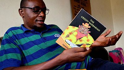 Ugandan author 'dumped at home by gunmen' after release from jail -lawyer