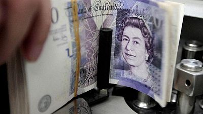 Sterling falls below $1.34 on Fed rate plans and PM's troubles