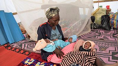 After narrow escape from violence, Cameroon refugee gives birth to triplets