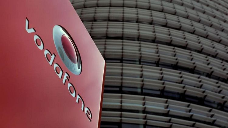Vodafone pledges better returns as quarterly revenue rises
