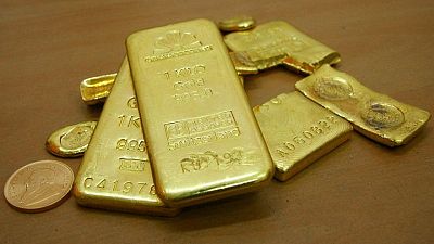 Gold jumps, stocks stumble as Ukraine crisis deepens