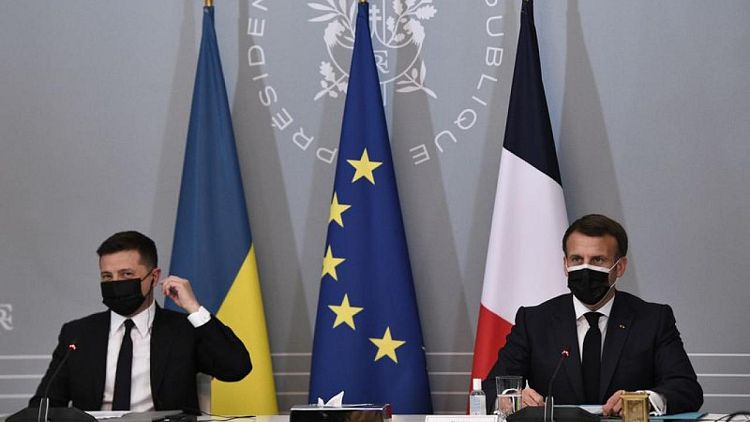 France's Macron discusses status of Donbass region with Russia's Putin, Ukraine's Zelensky
