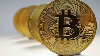 Bitcoin hits four-week high, ether at three-week peak
