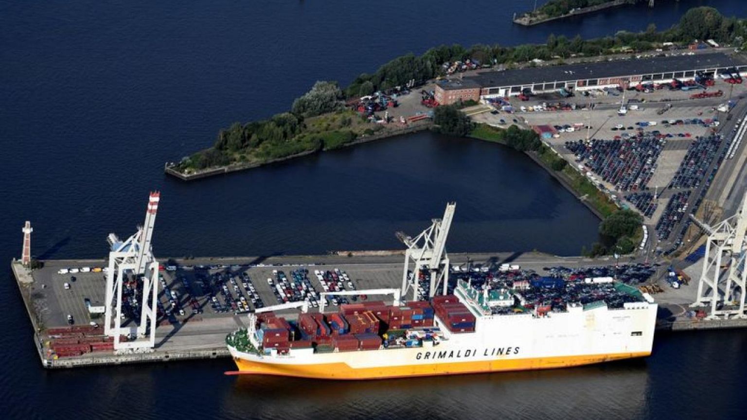 Costly energy imports push euro zone into trade deficit in June