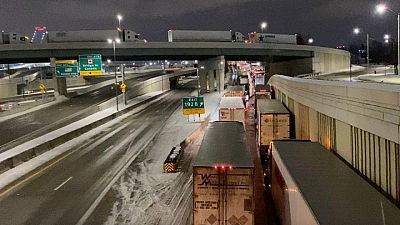Angry Canada truckers block busiest bridge with U.S.; Trudeau faces grilling Angry Canada truckers block busiest bridge with U.S.; Trudeau faces grilling