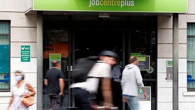 UK wages hit by inflation, unemployment rate steady