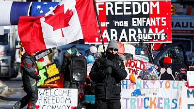 Trudeau invokes emergency powers to starve protesting Canadian trucker of funds