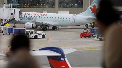 Exclusive-Canada to ease travel requirements as COVID cases decline - source