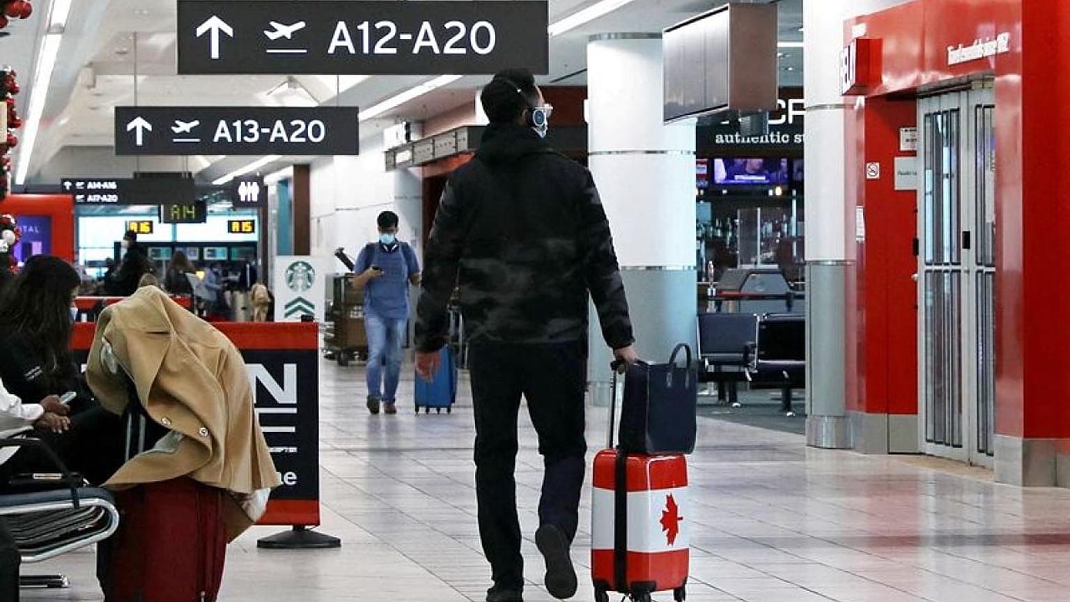 Exclusive-Canada to ease travel requirements as COVID cases decline - gov't source