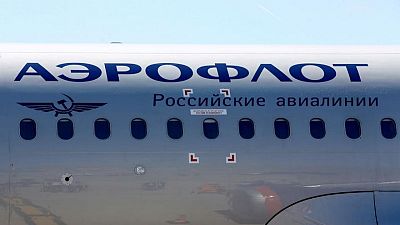 Soccer-Man Utd withdraws Russian airline Aeroflot's sponsorship rights