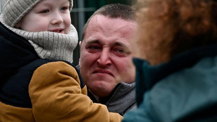 'We pray for Ukraine', people flee war into central Europe