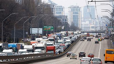Cars choke roads as Ukrainians flee Russian invaders Cars choke roads as Ukrainians flee Russian invaders