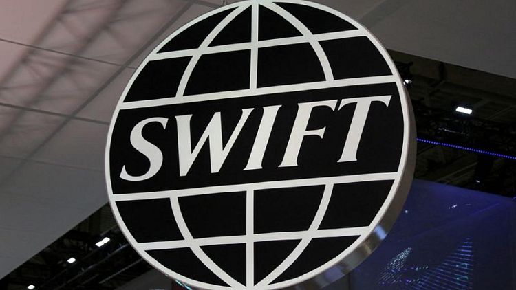 G7 says West to cut some Russian banks from SWIFT