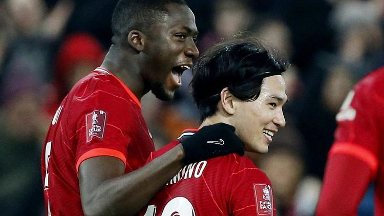 Soccer-Minamino double sends Liverpool into FA Cup last eight