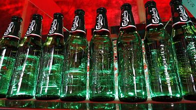Brewer Carlsberg halts exports, new investments into Russia