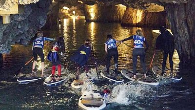 Europe's biggest underground lake hosts stand up paddle board race