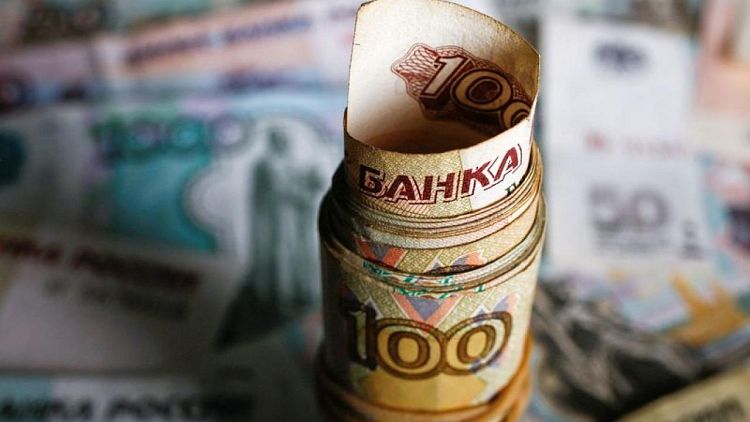 Sanctions-savaged Russia teeters on brink of historic default