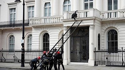 Police oust squatters from Russian oligarch's London mansion Police oust squatters from Russian oligarch's London mansion