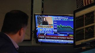 Wall Street stocks, U.S. yields rise after Fed rate hike