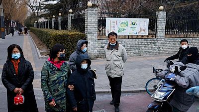 الصين تسجل 1335 إصابة جديدة بفيروس كورونا