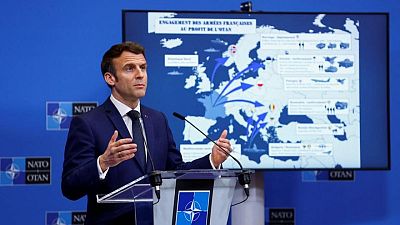 Macron underscores his leader credentials at NATO with a map