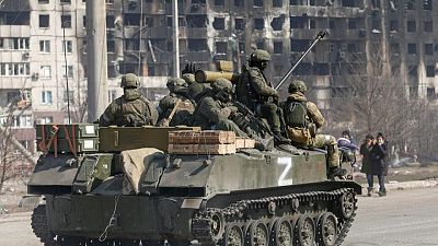 Analysis-Bogged down in Ukraine, Russia moves war goalposts