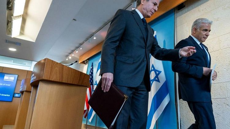 لابيد: إسرائيل ستتعاون مع أمريكا لمنع إيران من حيازة أسلحة نووية