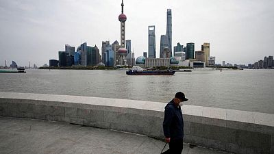 Shanghai locks down as COVID surges in China's financial hub