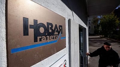 Russian reporters open outlet in Europe after Moscow-based paper suspends publication Russian reporters open outlet in Europe after Moscow-based paper suspends publication