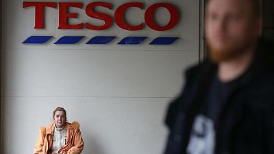 Britain's Tesco under pressure to raise staff pay rates after rivals hike