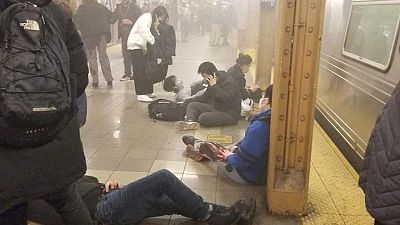 Manhunt under way for gunman in NYC subway attack that injured nearly 30