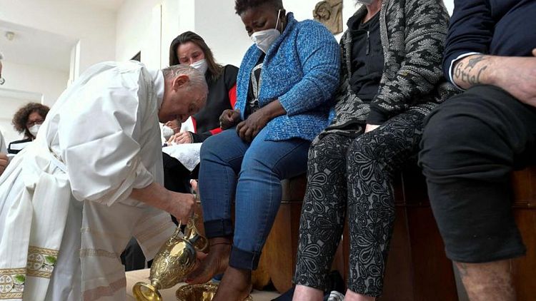 Pope visits Italian prison for traditional foot washing Mass