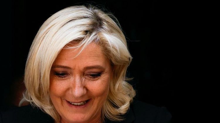 Faced with criticism, Le Pen allies tone down rhetoric on proposed hijab ban