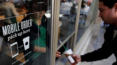 Starbucks eyes changes to mobile app, drive-thrus, taps ex-McDonald's exec
