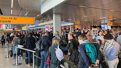 Amsterdam airport urges travellers to stay away as strike causes chaos