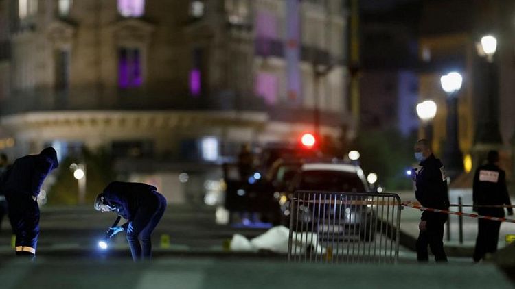Police fire on car in Paris, killing two