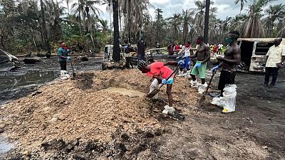 Nigeria conducts mass burial for victims of illegal refinery explosion