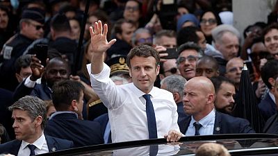 Macron, with eye on parliamentary poll, visits left-leaning Paris suburb