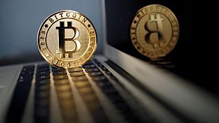 Bitcoin drops as Wall Street shares tumble