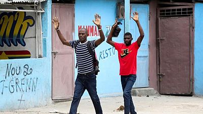 Dozens killed in Haiti in 2 weeks of gun battles, thousands flee homes