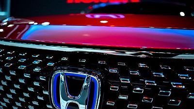 Honda warns of rising costs, forecasts weaker annual profit