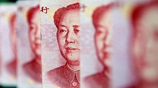 Chinese developers' debt woes worsen as sales, yuan weaken