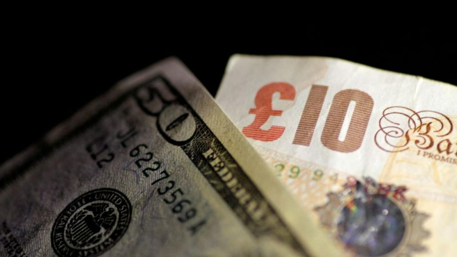 BRITAIN-STERLING:Sterling steadies vs dollar ahead of BoE, ECB meetings 