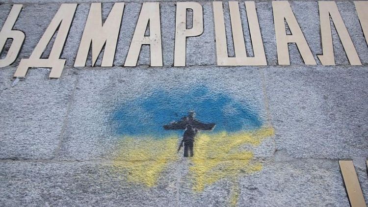 Vandals daub Ukraine colours on Swiss monument to Russian soldiers