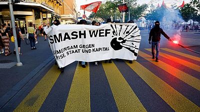Protesters clash with police ahead of Davos meeting