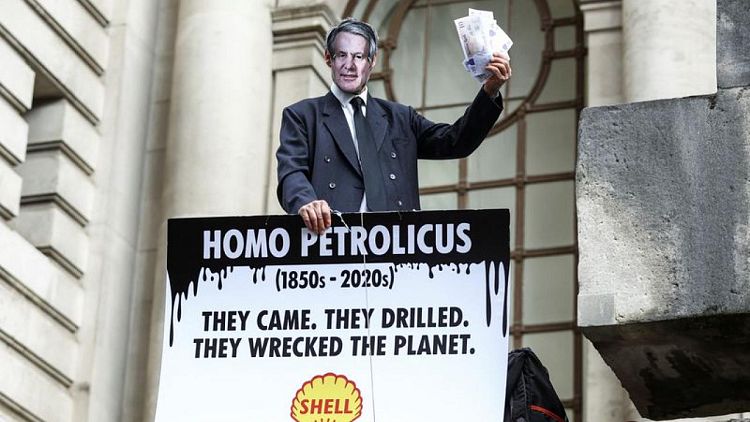 Climate protesters disrupt Shell shareholder meeting