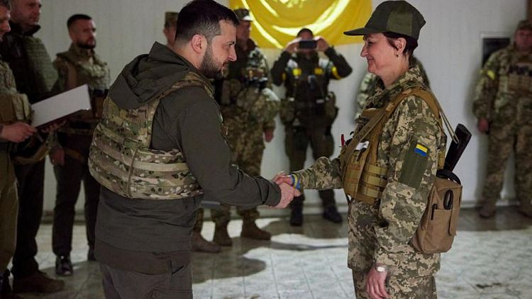 Ukraine's Zelenskiy visits frontlines in first visit outside Kyiv region