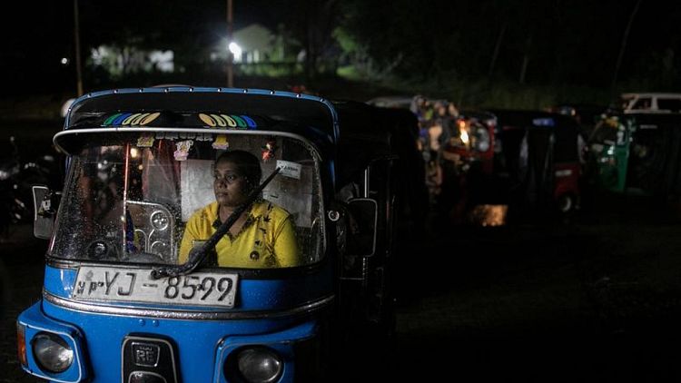 Sri Lankan woman rickshaw driver has to queue 12 hours, or more, for fuel