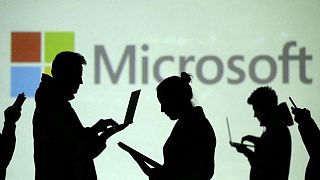 Microsoft cuts quarterly forecast for revenue, profit on forex hit