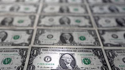 Dollar heads for weekly gain as investors weigh rates, recession risks